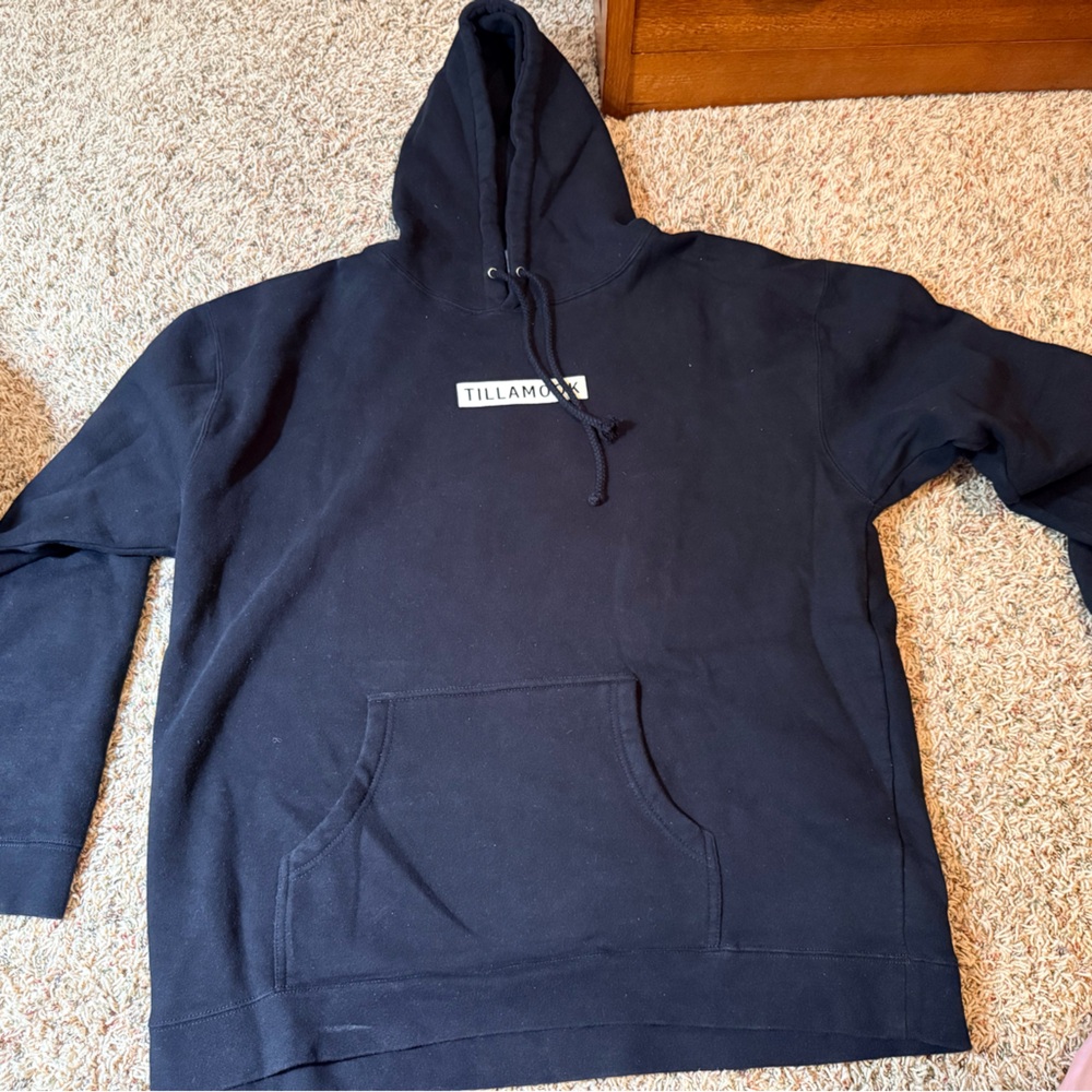Tillamook Creamery hoodie.  Black with front pocket.